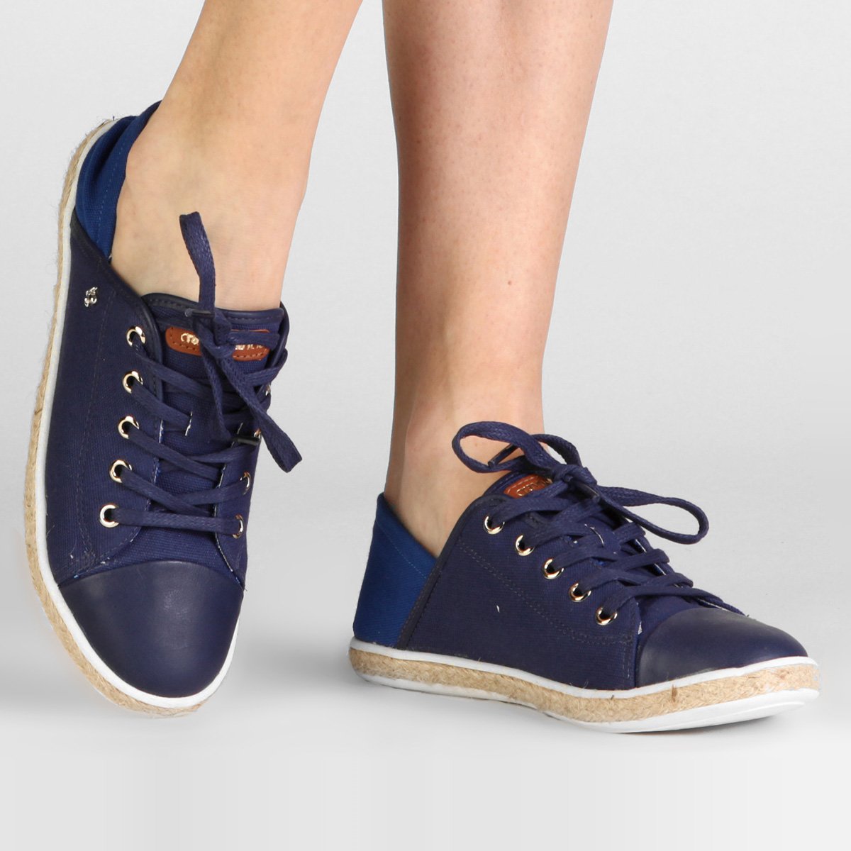 tenis cravo e canela netshoes